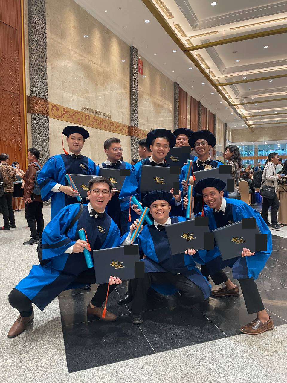 Bachelor's graduation with fellow graduates